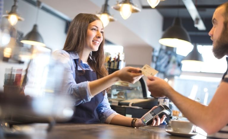 Person paying with a credit card